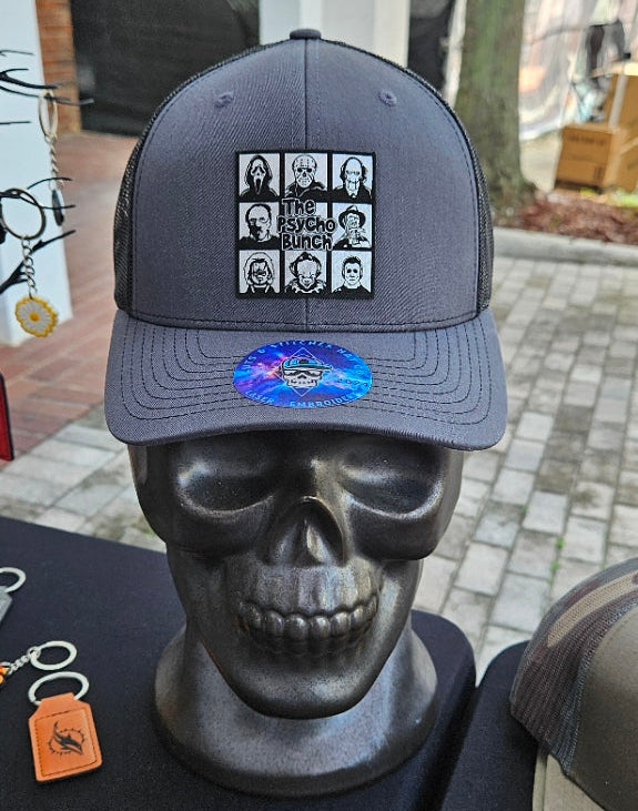 The Psycho Bunch Charcoal / Black Trucker Hat